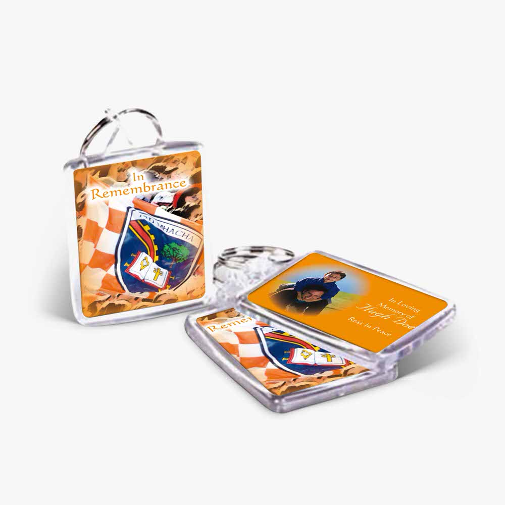 a key chain with an orange and white design