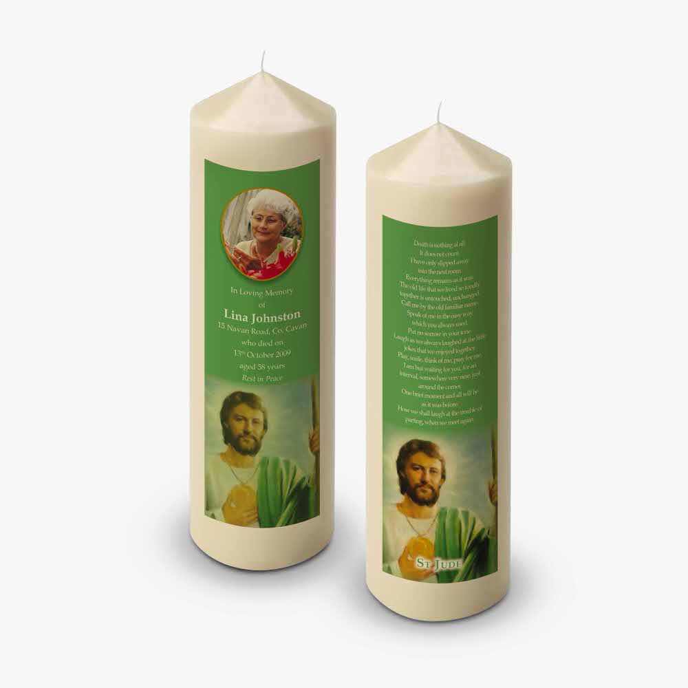 two candles with a picture of a man and a woman