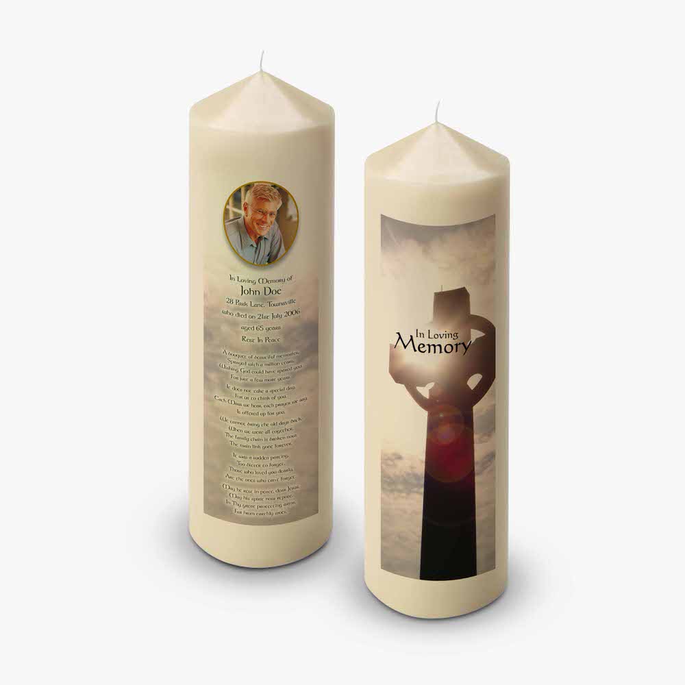 a candle with a photo of a man and a woman