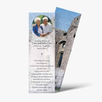 a bookmark with a picture of two people in front of a castle