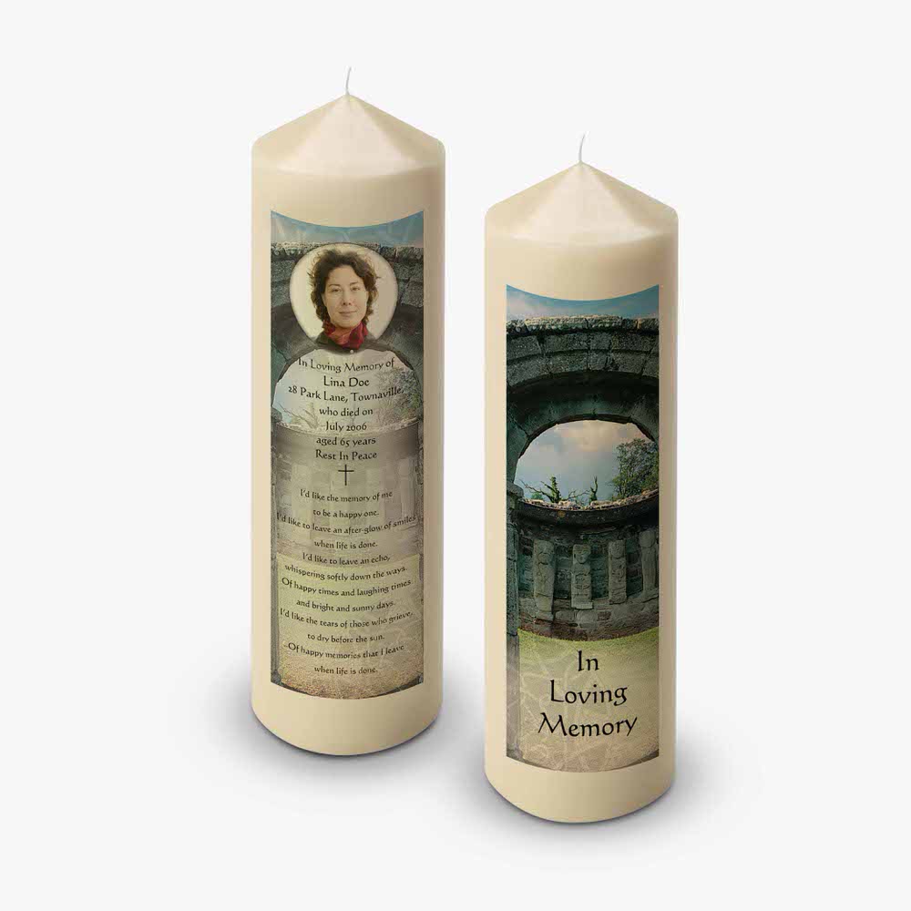 two candles with a picture of a woman and a poem