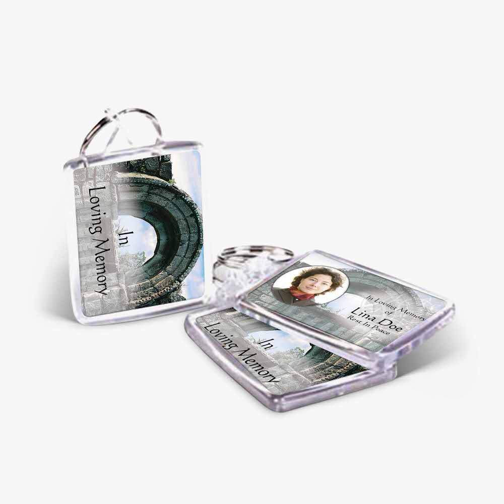 a clear plastic keychain with a photo of a person