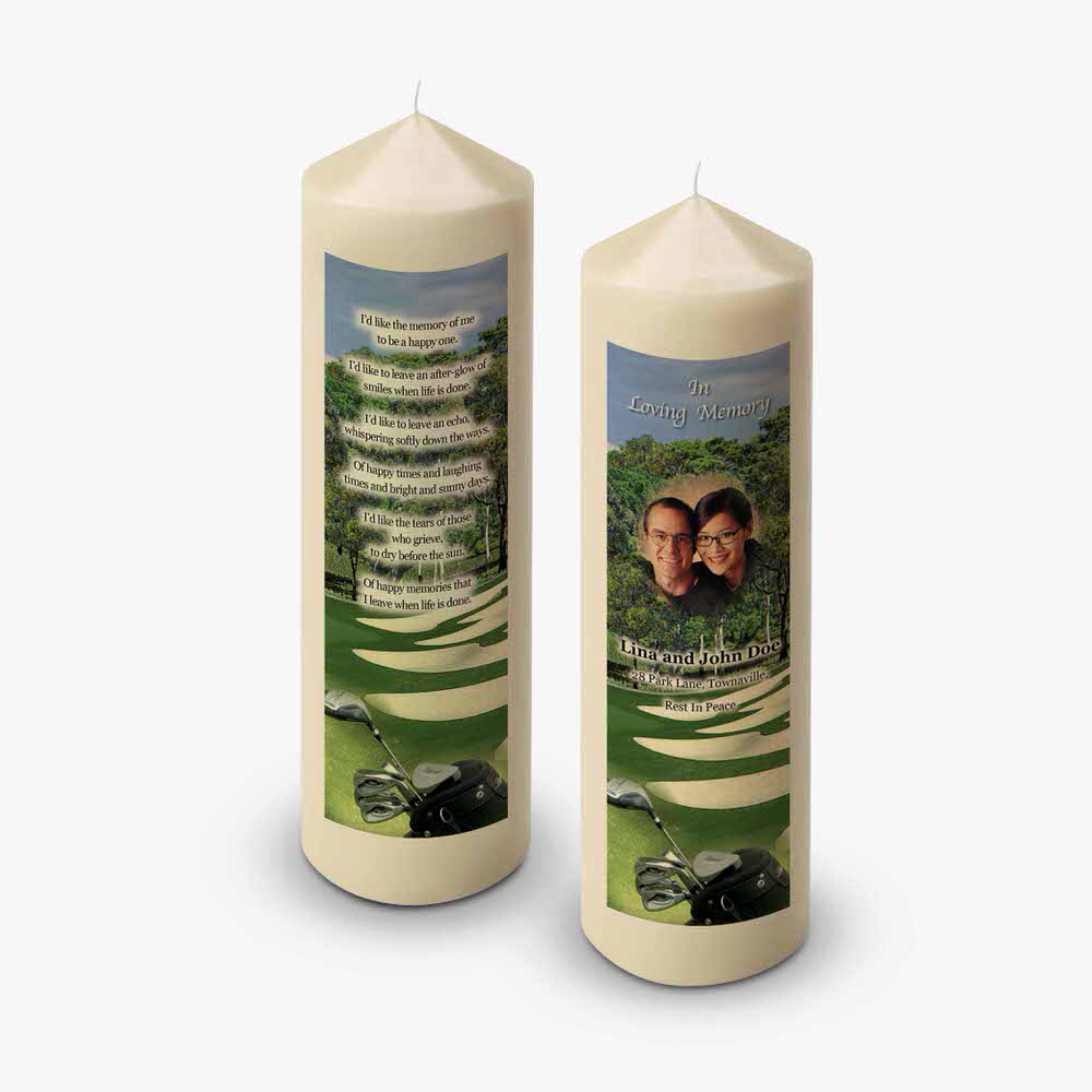 two candles with a picture of a golf course