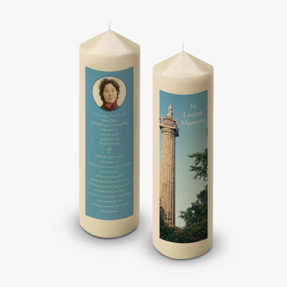 a candle with a photo of a woman on it