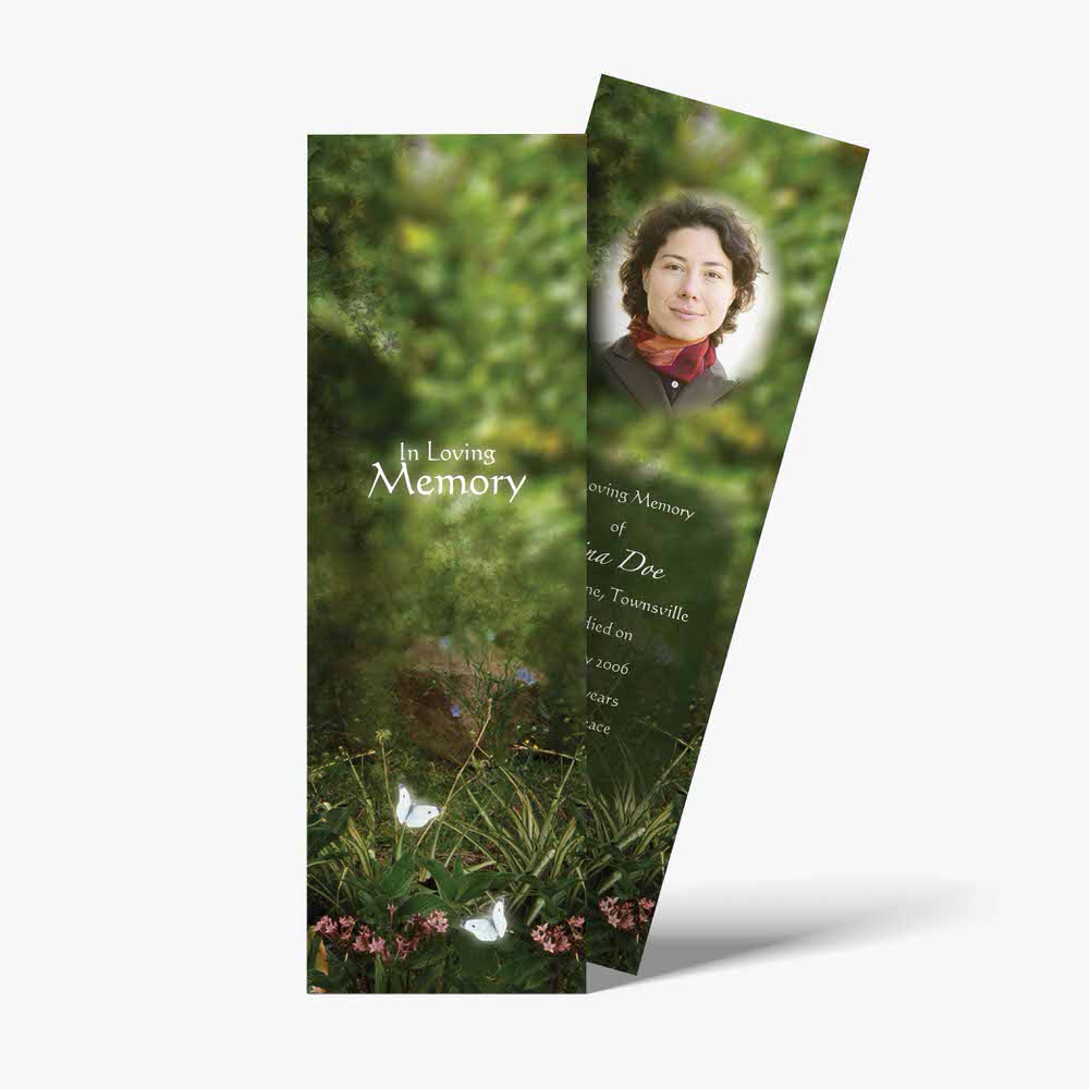 a bookmark with a photo of a woman in the grass