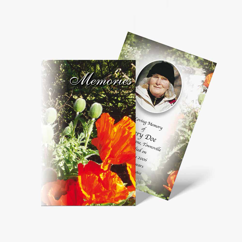 a funeral card with a photo of a woman and flowers