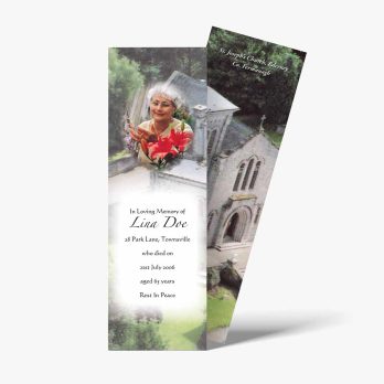 a bookmark with a photo of a church and a flower