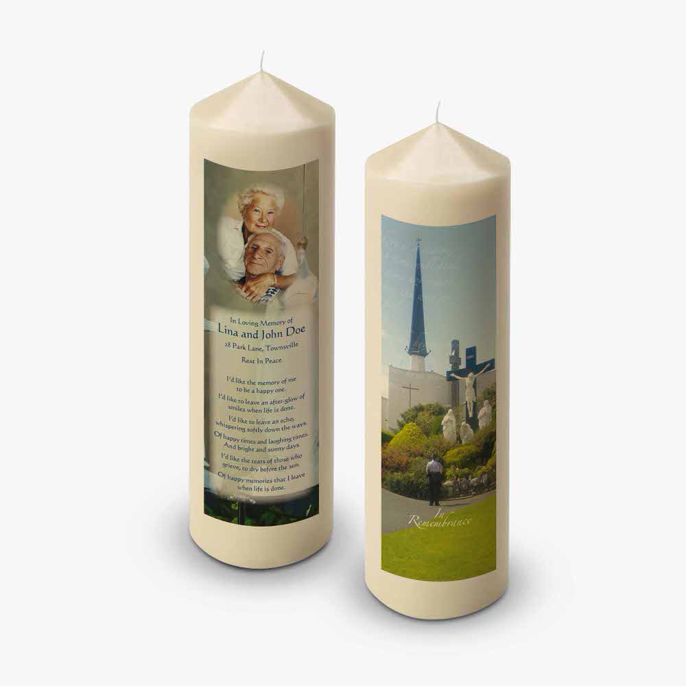 two candles with a picture of a church and a picture of a person