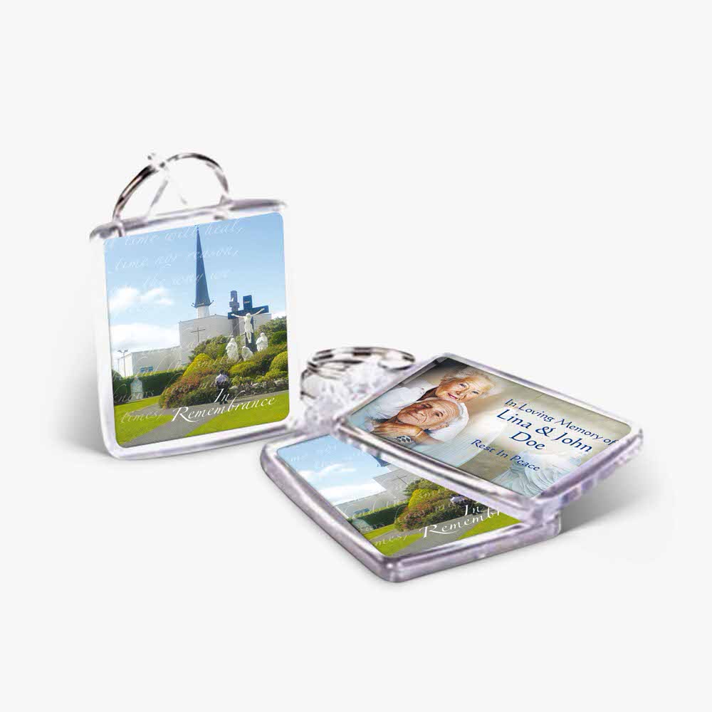 a clear keychain with a picture of a castle