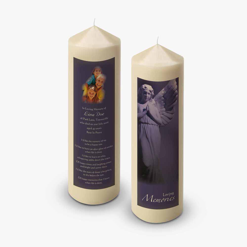 a candle with a picture of an angel on it