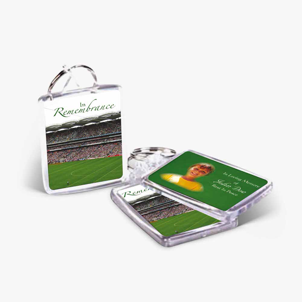 a keyring with a photo of a football field