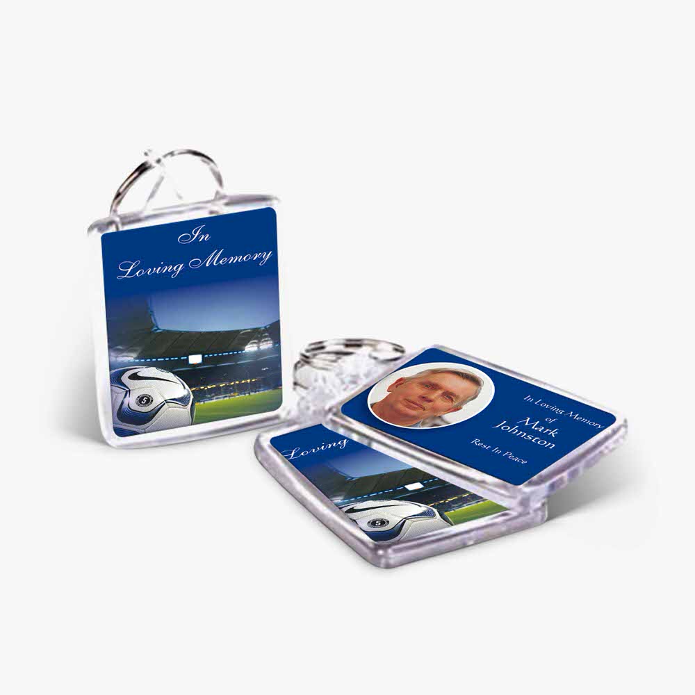 a keyring with a photo of a car and a car key