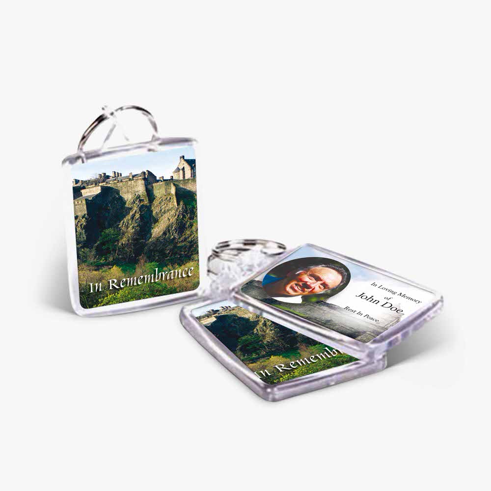a keychain with a photo of a castle
