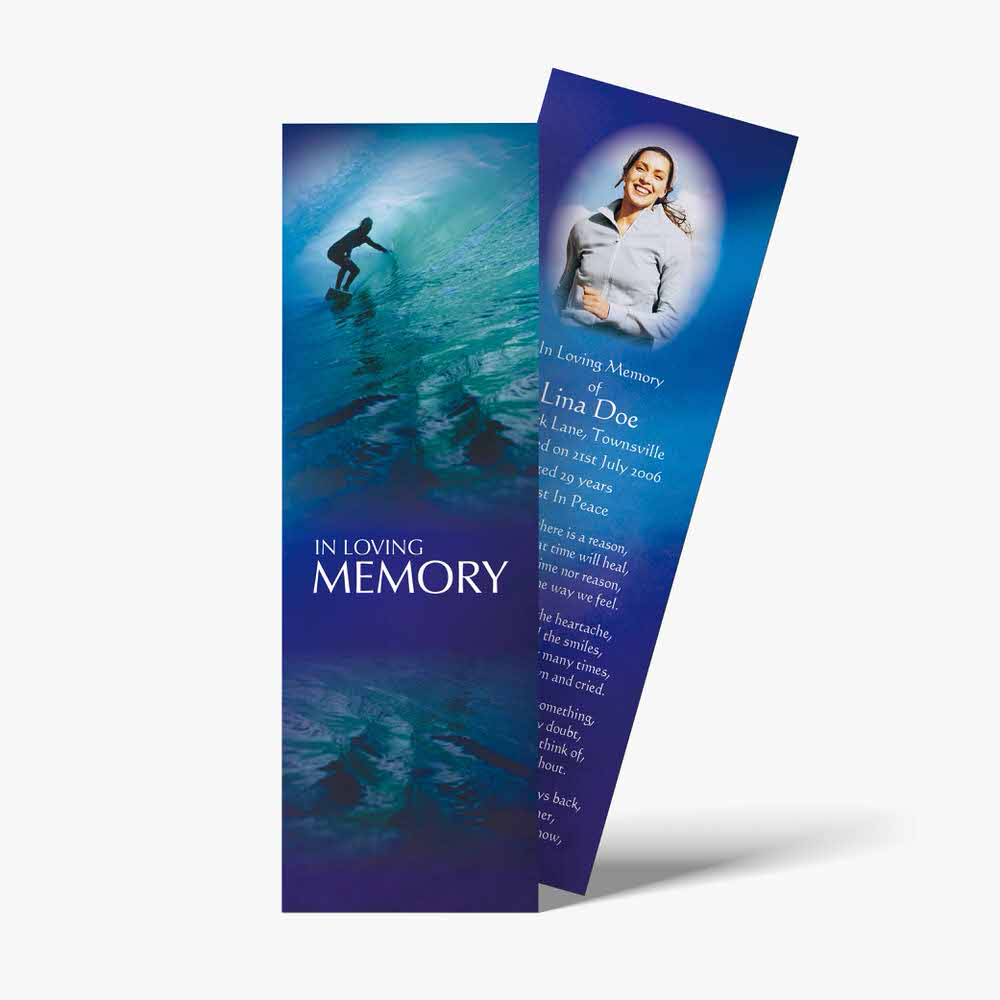 a bookmark with a photo of a surfer on the ocean
