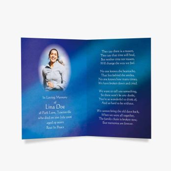 a blue and white funeral card with a photo of a woman in a blue dress