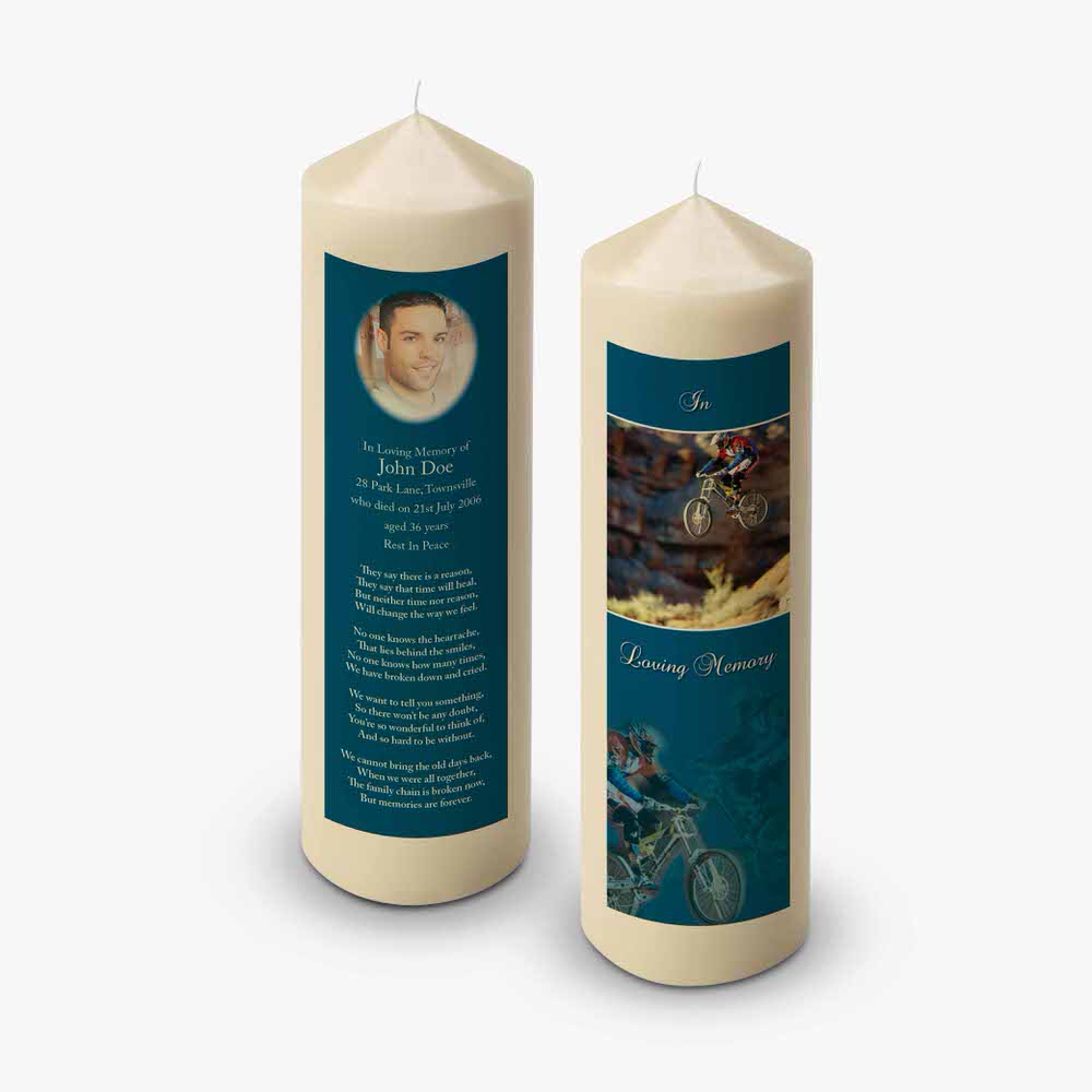 a candle with a photo of a man on a bike