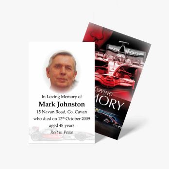 a book with a picture of a racing car and a card