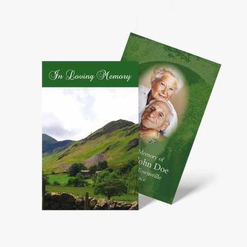 a funeral card with a photo of a man and woman in the mountains