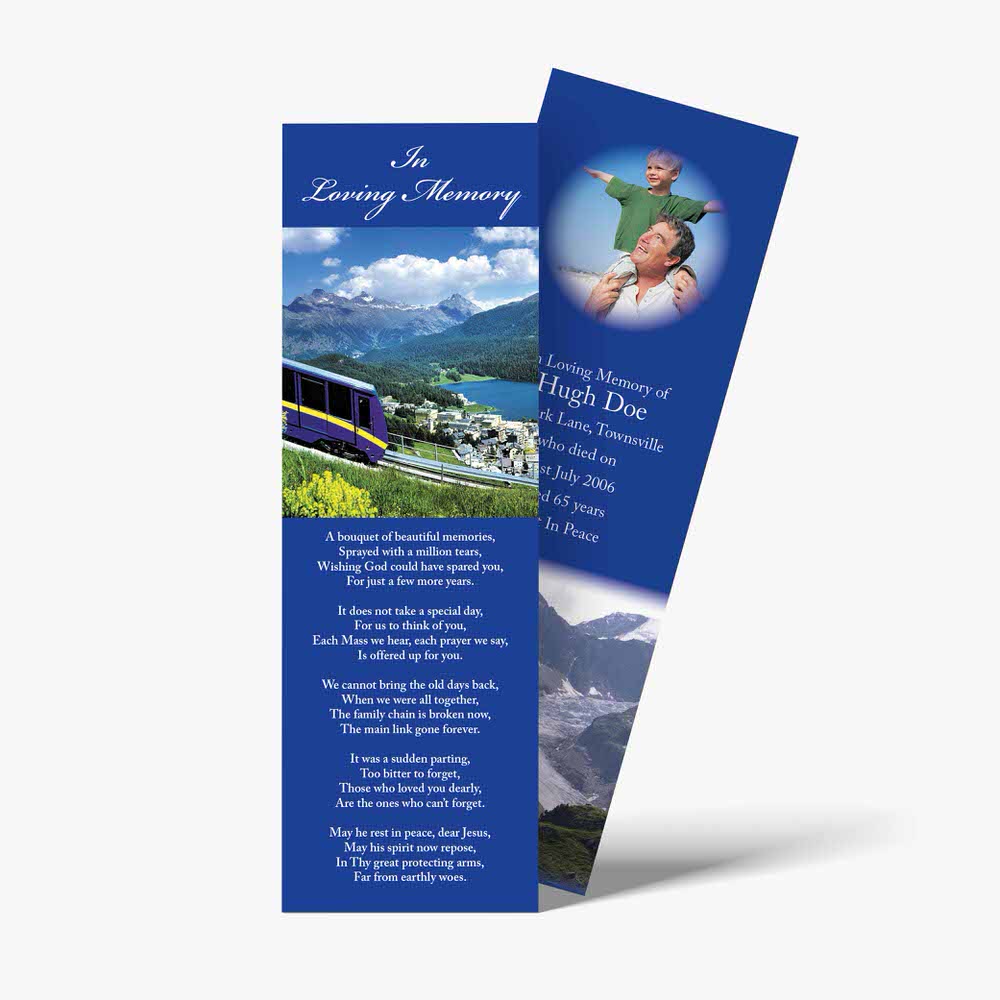 a bookmark with a picture of a mountain range and a train