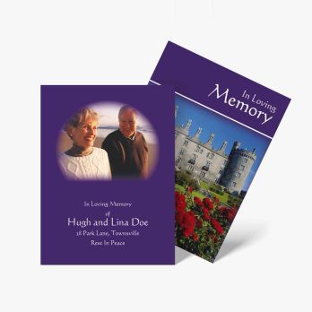 two purple memory books with a castle in the background
