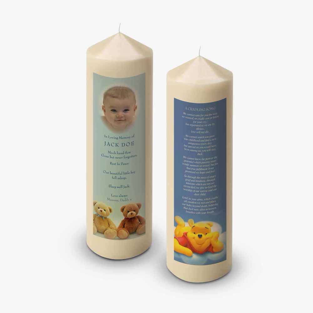 two candles with a baby and teddy bears