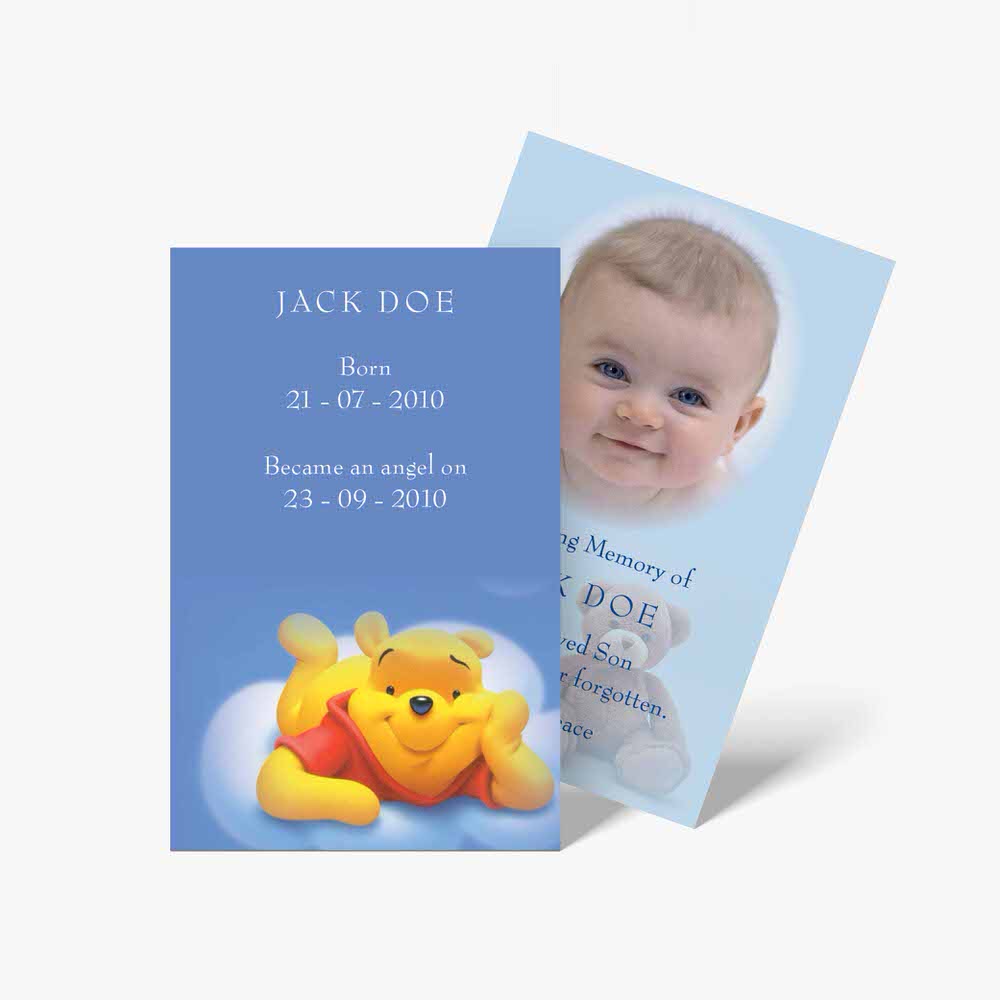 a baby's photo card with a blue background and a winnie the pooh bear