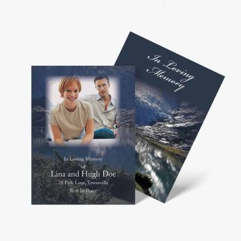 a funeral card with a photo of a couple and a mountain