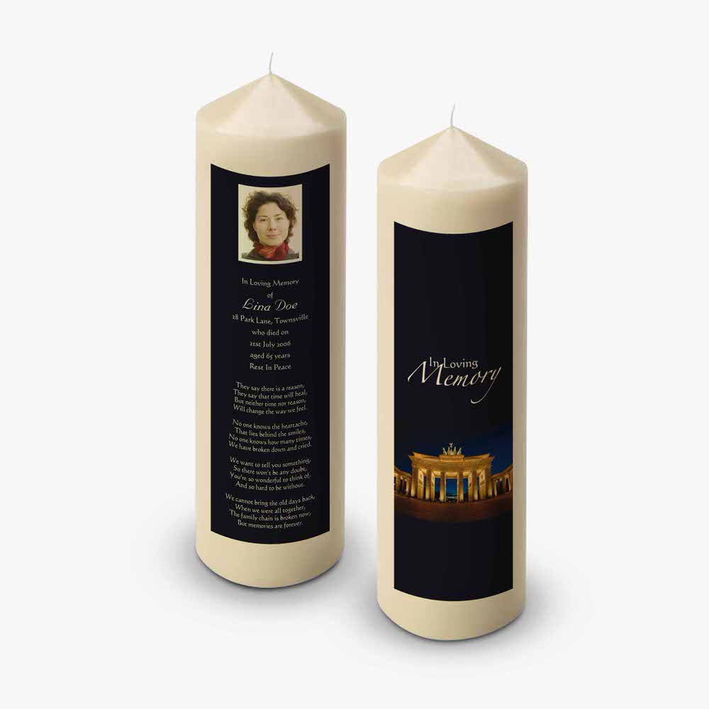 a candle with a photo of a woman on it