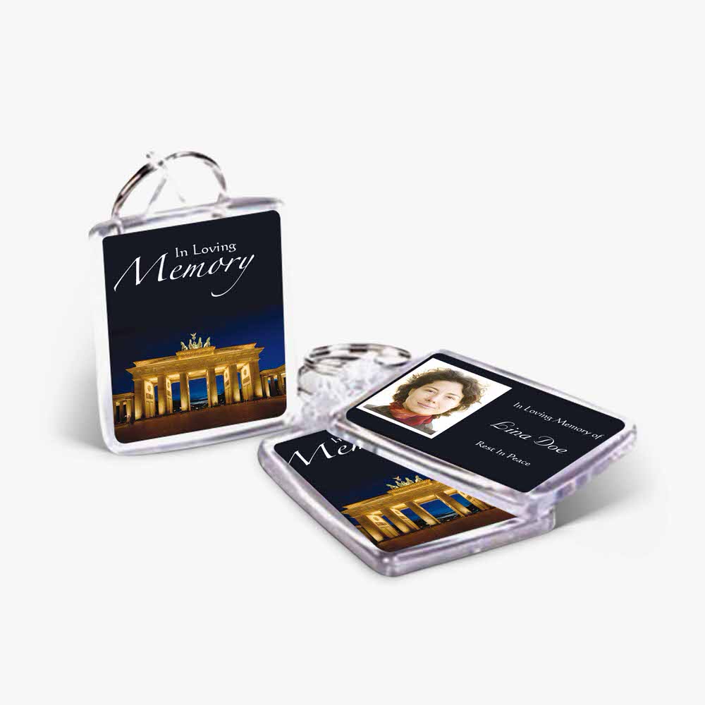 a photo keychain with a photo of the brandenburg gate