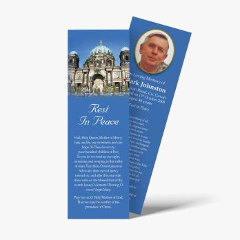 a bookmark with a photo of a church and a quote