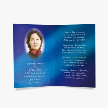 a blue and white funeral card with a photo of a woman in a blue dress