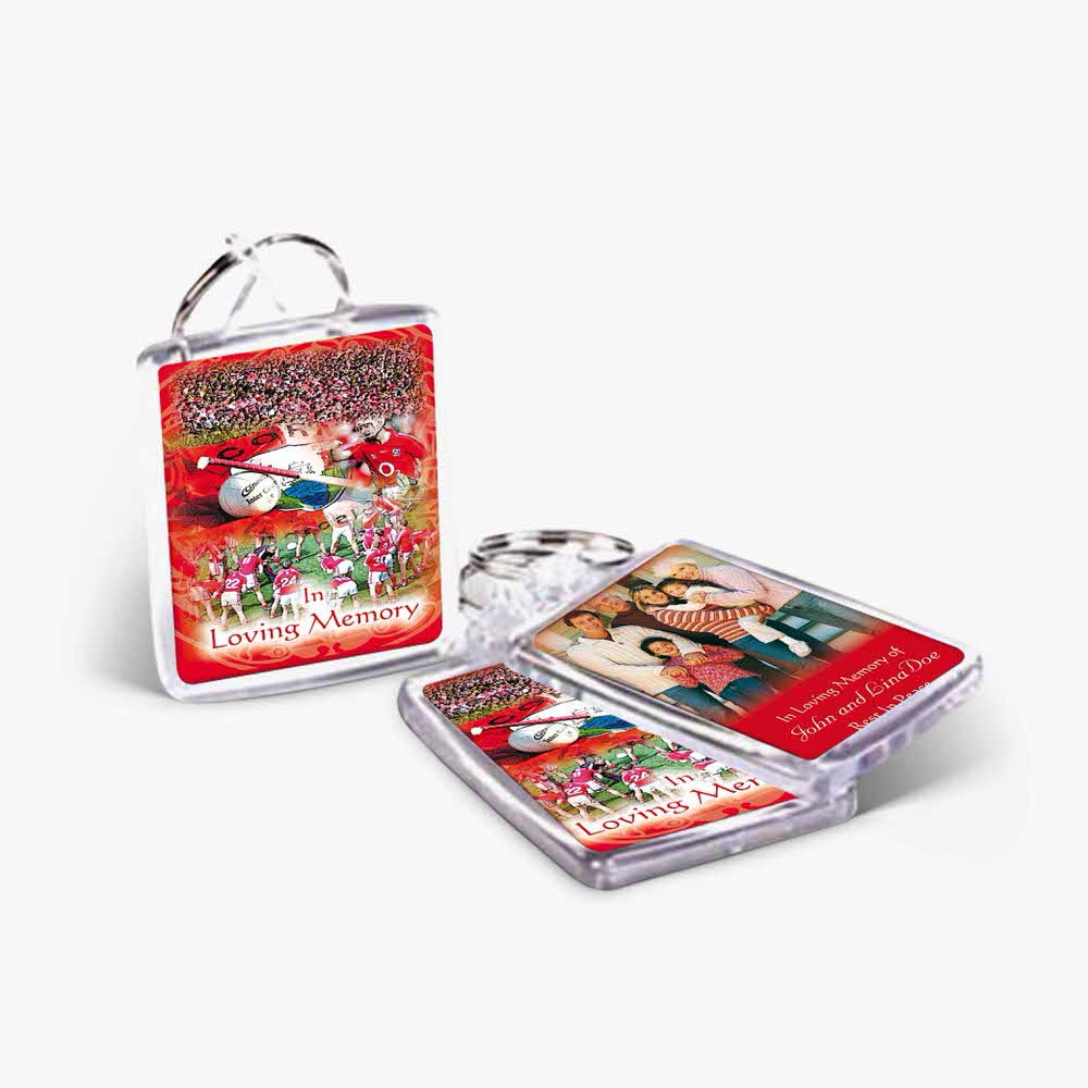 two key chains with christmas cards on them