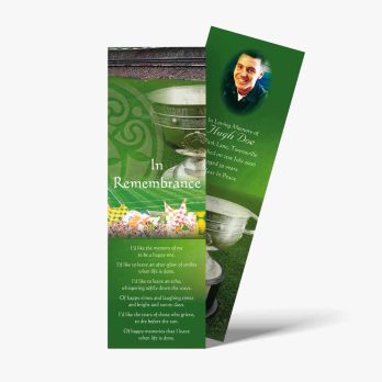a green bookmark with a picture of a cup and flowers