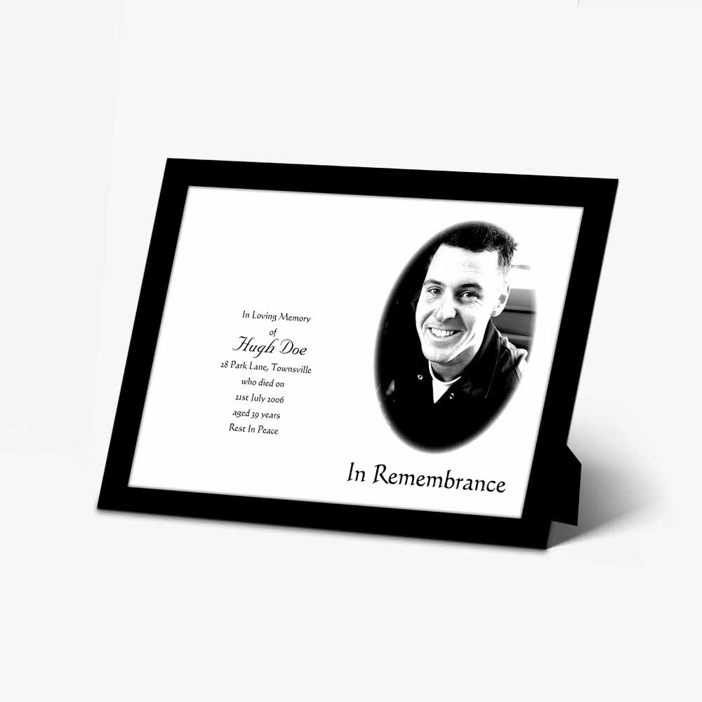 a black and white photo frame with a black and white photo of a man in a suit