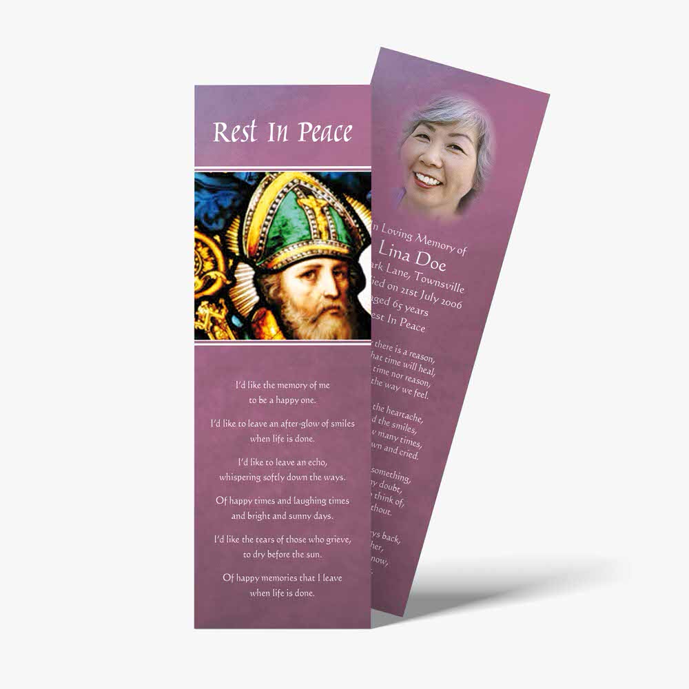 a bookmark with a picture of a saint on it