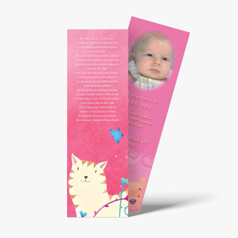 a pink bookmark with a baby's picture on it