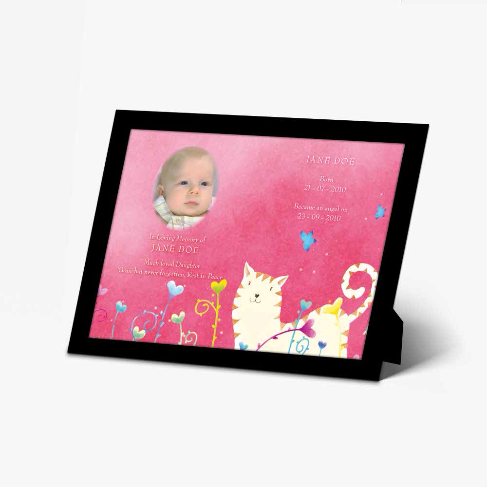 a baby's photo is displayed on a pink frame