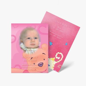 a baby's photo is on a pink card with a bear