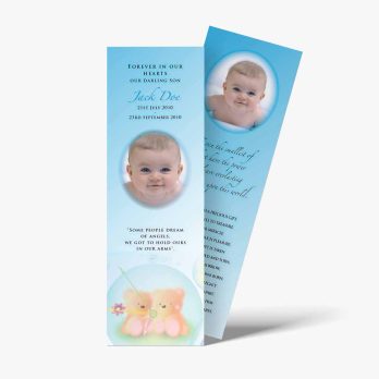 a baby's baptism bookmark with a photo of a baby
