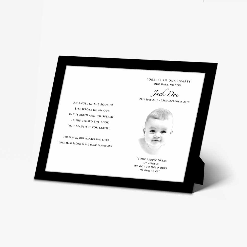 a black and white photo of a baby in a frame