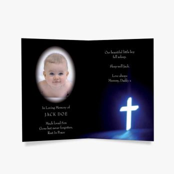 a baby's baptism photo in a cross