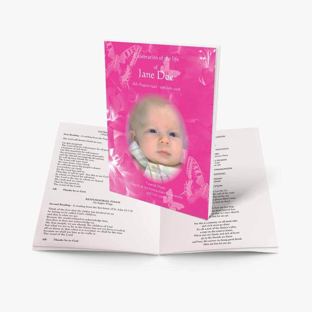 a pink baby book with a photo of a baby in it