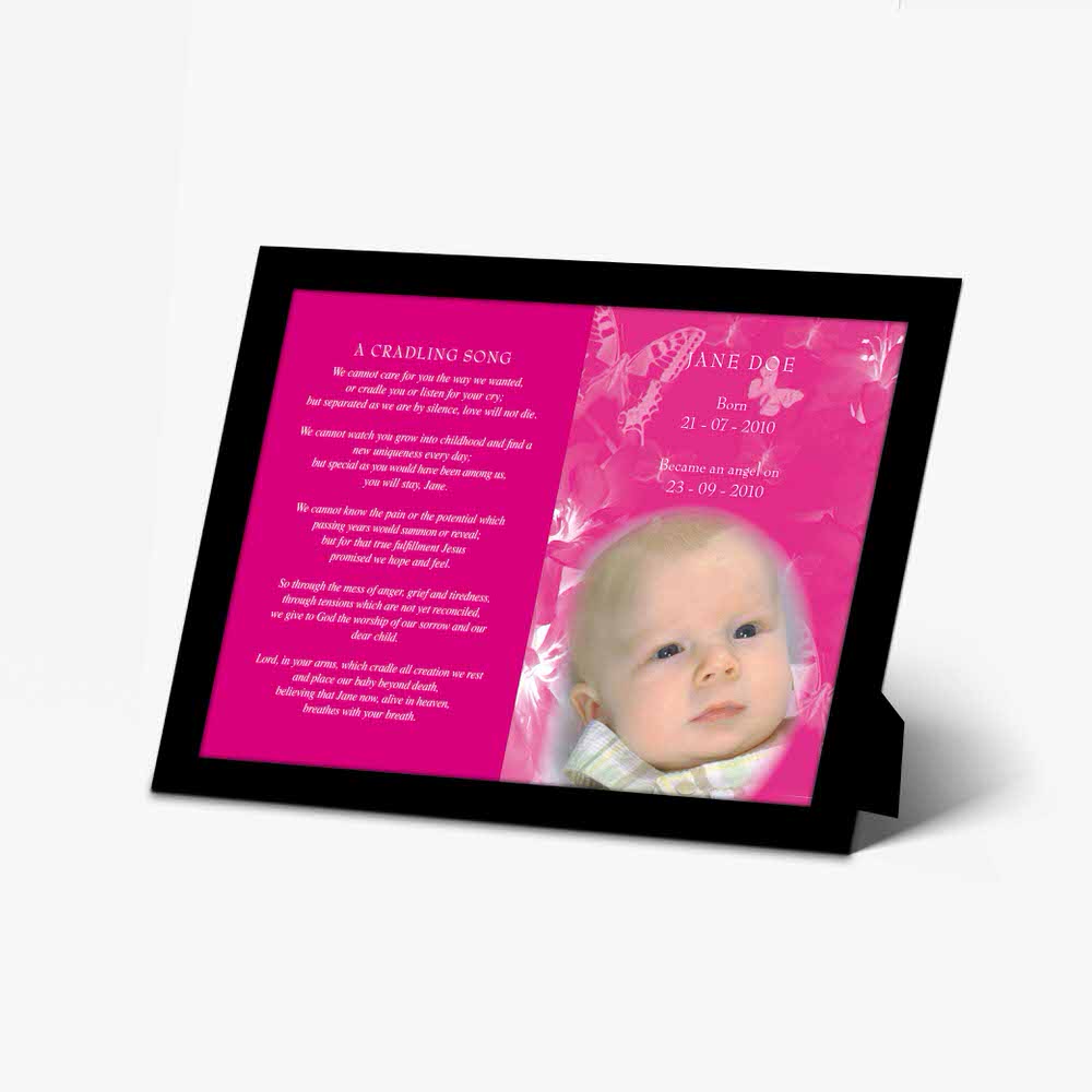 a baby's photo is displayed on a pink frame