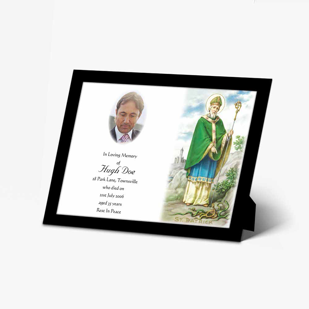 a framed photo of a saint in green and white