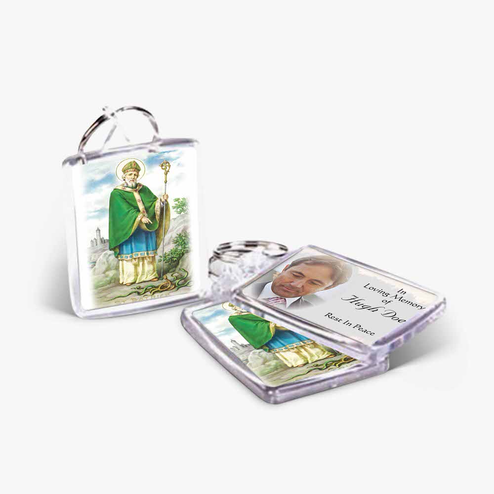 a key chain with a picture of st patrick