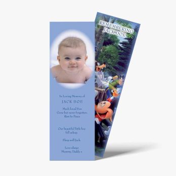 a baby's baptism bookmark with a photo of a baby