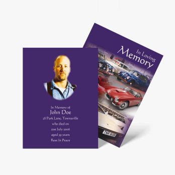 a purple book with a photo of a car and a card