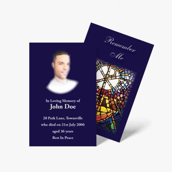 a funeral card with a stained glass window and a photo of a man