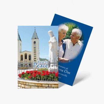 a blue and white card with a photo of a church and a statue