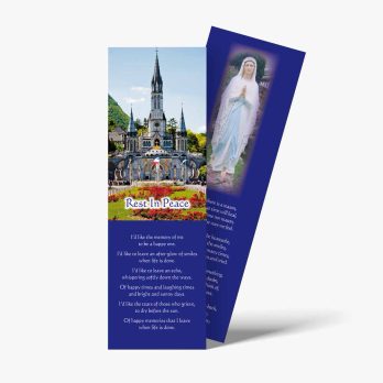 a bookmark with a picture of the statue of the virgin mary